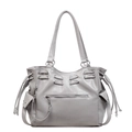 Bolso tote grande gris claro con bolsillos de cremallera y cordones en fondo blanco - Gris