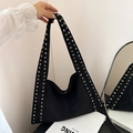 Borsa tote in tela nera minimalista con tracolla decorata da occhielli in metallo dorato - Nero