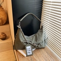 Retro grey-green shoulder bag in matte faux leather with a woven handle and charm - Green