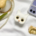 Detailed view of a cute 3D cat phone grip on elegant white satin with luxury pearls - 3D White Cat Bracket - Gold Eyes