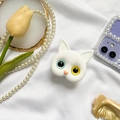 Detail view of a cute white cat phone socket with heterochromia eyes on silk fabric - 3D White Cat Bracket - Gold Blue Heterochromia
