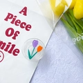 Flat round glitter phone grip with tulip pattern on transparent acrylic holder - Purple and Orange Double Tulips