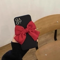 Black matte phone case featuring a large decorative red satin bow for iPhone 16 Pro Max - Red / iPhone 12 Pro Max