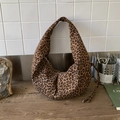 Hobo shoulder bag featuring retro leopard print canvas and comfortable wide strap - Leopard Print