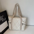 Quilted cream tote bag with rhombic pattern and adjustable khaki shoulder straps - Off White