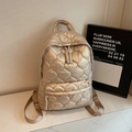 Champagne gold quilted backpack for women with metallic nylon finish and large lattice pattern - Gold