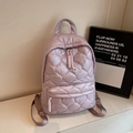 Lavender purple quilted backpack for women featuring stylish heart stitching pattern - Purple