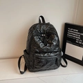Zaino in nylon nero trapuntato con goffratura a fiocco e tasche laterali capienti - Nero