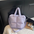 Quilted light purple tote bag with padded bubble texture and adjustable shoulder strap - Purple