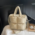 Quilted beige puffer tote bag with adjustable shoulder strap and padded handles - Off-white