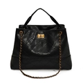 Quilted black bucket bag with gold clasp and chain strap in classic minimalist style - Black