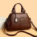 Classic dark brown lychee leather Boston bag with double handles and adjustable shoulder strap - Brown