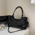 Glossy black patent leather tote bag with drawstring details and adjustable shoulder strap - Black