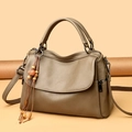 Large khaki lychee grain leather tote bag with ethnic wooden bead charm and crossbody strap - One Size / Khaki