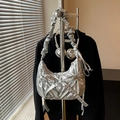 Metallic silver puffy crossbody bag with drawstring bow and scrunchie strap detail - Silver