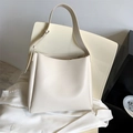 Creamy white two-piece bucket bag set with minimalist leather tote and adjustable strap - White