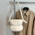 Minimalist beige puffed cloud shoulder bag with quilted details and knotted strap style - White
