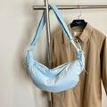 Minimalist light blue crescent bag with pleated nylon fabric and adjustable shoulder strap - Crescent Moon / Light Blue
