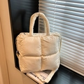 Chic quilted puffer tote bag in creamy white nylon, minimalist style for winter - White