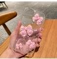 Dettaglio di fiocchi rosa 3D e glitter argento in una custodia trasparente per iPhone - Cielo Stellato-Fiocco Rosa / iPhone XR