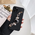 Custodia nera opaca per iPhone con catena dorata e grandi strass neri dal design lussuoso - Nero (con bracciale in pietra nera) / iPhone 13PRO