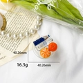 Miniature beer bottle phone grip and air cushion stand with orange slice design - Beer Orange