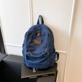 Dark blue denim canvas backpack with leather logo patch and zipper pocket for casual wear - Dark Blue