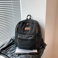 Sac à dos tendance en denim noir avec écusson en cuir et design spacieux multi-poches - Noir