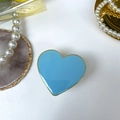 Sky blue heart-shaped foldable phone socket with golden metallic edge on marble coaster - Macaron Light Blue