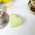 Pale yellow heart-shaped phone grip with glossy resin finish and gold metallic edges - Macaron Fluorescent Yellow