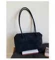 Detail of minimalist black matte suede tote bag with long straps on minimalist background - One Size / Black
