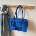 Royal blue suede baguette shoulder bag with adjustable strap and mini pouch charm - Blue