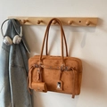 Brown suede shoulder bag with decorative buckle and matching mini pouch on hook - Brown