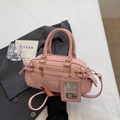 Pink Boston style leather handbag with detachable strap and cute decorative tag - Pink