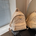 Mochila acolchada beige con compartimentos múltiples y estilo moderno para el trayecto - Caqui