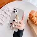 Funda transparente para iPhone con cadena de mármol y detalles dorados en mesa - Pulsera de mármol albaricoque / iPhone 6/6S