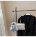 Detailed view of silver shoulder bag with white lace bow and metallic texture - Silver