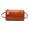 Reddish brown vintage leather Boston bag with natural grain and cylindrical shape - Tan
