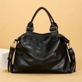 Chic black tote bag with wrinkled faux leather texture and adjustable shoulder strap - Black