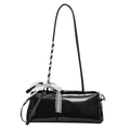 Chic black glossy shoulder bag with a delicate white lace bow detail on a white background - Black