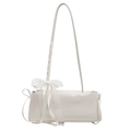 White faux leather baguette bag with oversized lace bow and thin shoulder strap - White