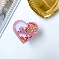 Detail der rosa Herz-Handyhalterung mit Smile-Schriftzug und Glitzer-Quicksand - Rosa Herz Smile