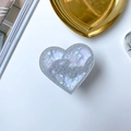 Detail eines herzförmigen Glitzer-Handyhalters mit Angel-Schriftzug und Pailletten - Silbernes Herz Angel