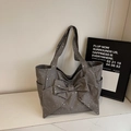 Grey canvas tote bag with white star patterns and a large 3D bow decoration - Gray