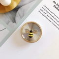 Macro shot of bee pattern phone grip with enamel finish and sparkling rhinestones - No.14 Bee - Silver