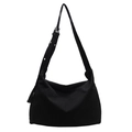 Large black pleated tote bag with adjustable shoulder strap and textured canvas fabric - Black