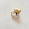 Plüschtier Bär Handyhalterung mit herzförmigem Strass-Spiegel auf beige Hintergrund in Beige - Braun
