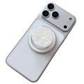 Close-up of circular magnetic phone stand with white shell texture on a smartphone - Iridescent White