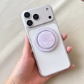 Detalle de funda MagSafe blanca con soporte plegable de textura de concha púrpura - Púrpura Iridiscente