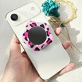 Close-up of pink leopard flower phone socket with integrated mirror on a white phone - Magnetic Stand / Pink Leopard